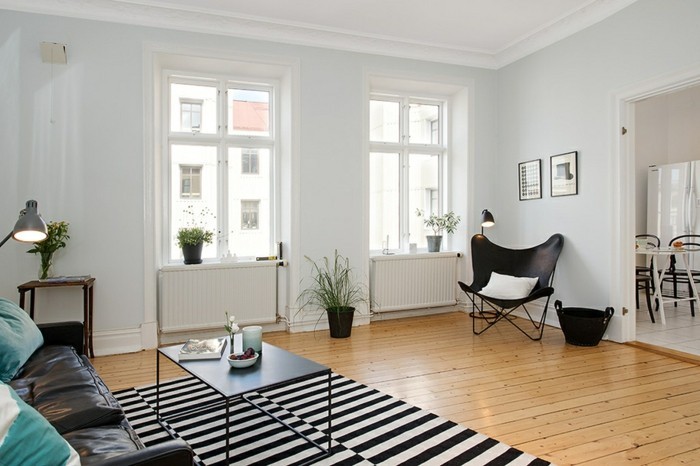 fauteuils-fauteuil-vintage-fauteuil-bas-design-original-fauteuil-scandinave-tapis-noir-et-blanc