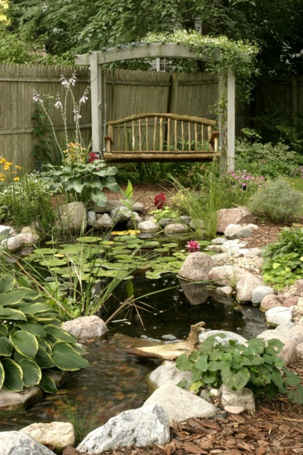 bassin--de-jardin-préformé-avec-des-pierres-banc-vitange-style