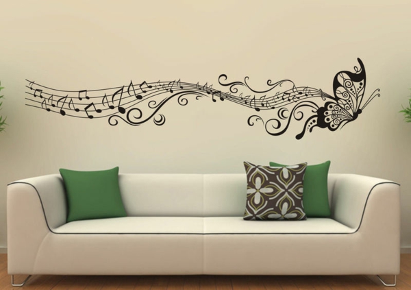sticker-mural-noir-blanc-sofa-blanc-coussins-coloré