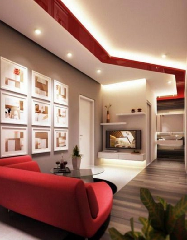 salle-de-sejour-canape-rouge plafond-suspendu lumieres-