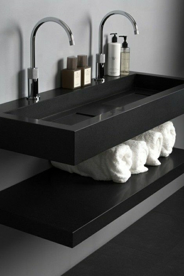 lavabo-noir-salle-de-bain-place-de-rangement-en noir-avec-des-serviettes-blanches