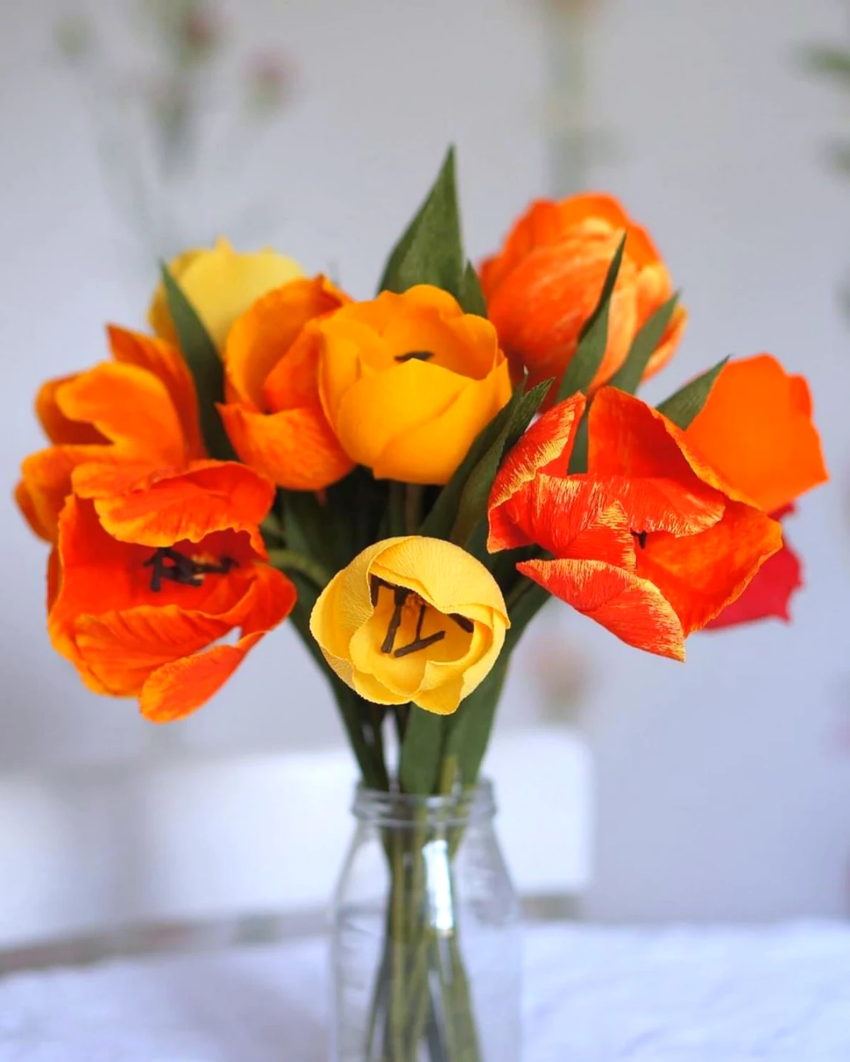 tuto fleur en papier crepon bouquet avec des fleurs oranges