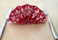 Une origami serviette resplendit la table et vous donne une humeur optimistique
