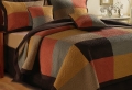 Le couvre lit patchwork est une jolie finition pour votre chambre à coucher