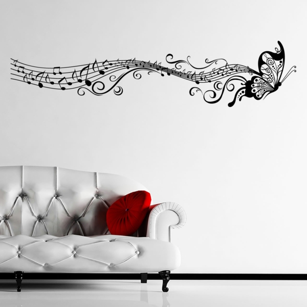 chambre-blanche-sofa-coussin-rouge-papillon-sticker-de-mur