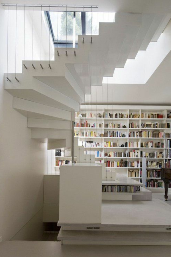 loft-parisien-bibliothèque-et-escalier-demi-tournant