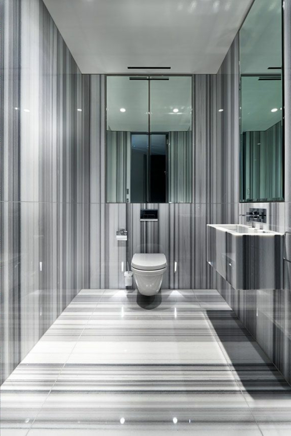 salle-de-bains-grise-intérieur-unique-et-superficies-polies