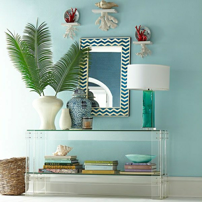 meubles-rétro-commode-en-bois-d-entrée-noire-murs-bleus-miroir-plante