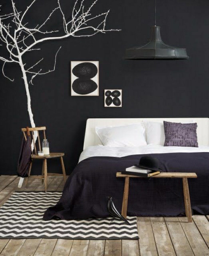 chambre-a-coucher-blanc-noir-arbre-mural-décoraif-tapis-blanc-noir-lit