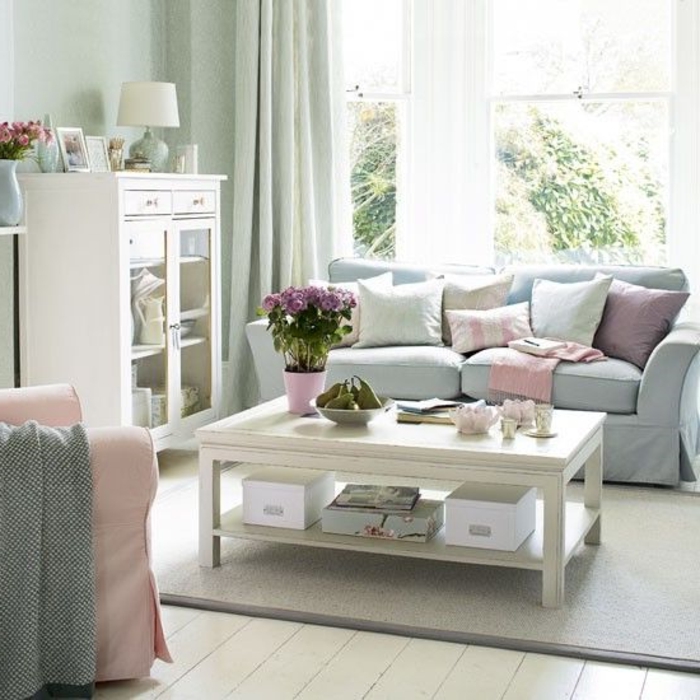 meubles-scandinaves-palaiseau-canapé-bleu-avec-coussins-décoratifs-colorés-meubles-de-salon