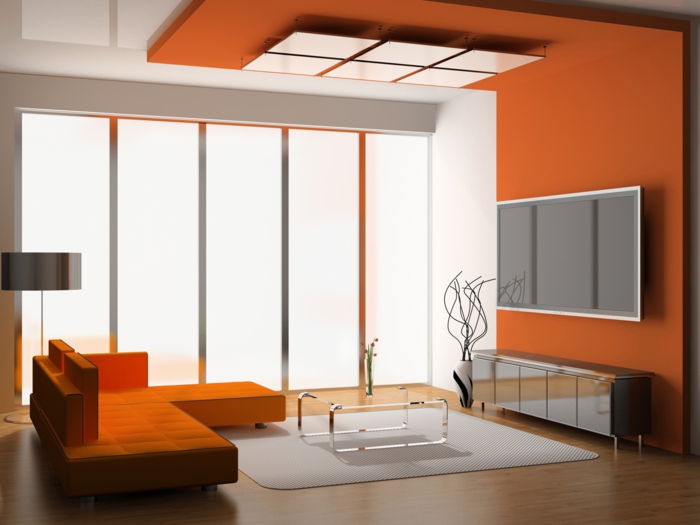 tapis-gris-petite-table-verre-transparente-canapé-orange-lampe-de-salon-gris-fenetre-grande-lampe-de-salon-gris