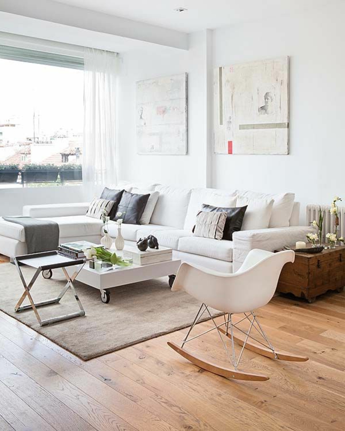1-intérieurs-scandinaves-avec-meuble-norvegien-avec-tapis-en-rotin-beige-chaise-blanche