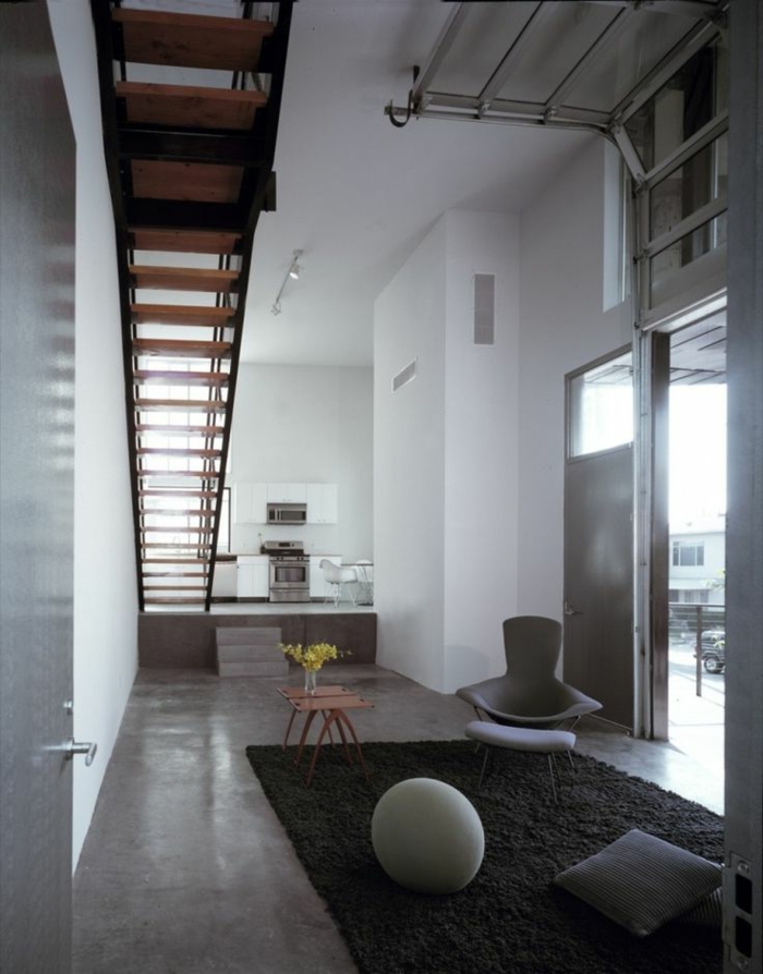 béton-ciré-plan-de-travail-un-joli-salon-avec-intérieur-gris-et-tapis-gris-foncé-murs-blancs