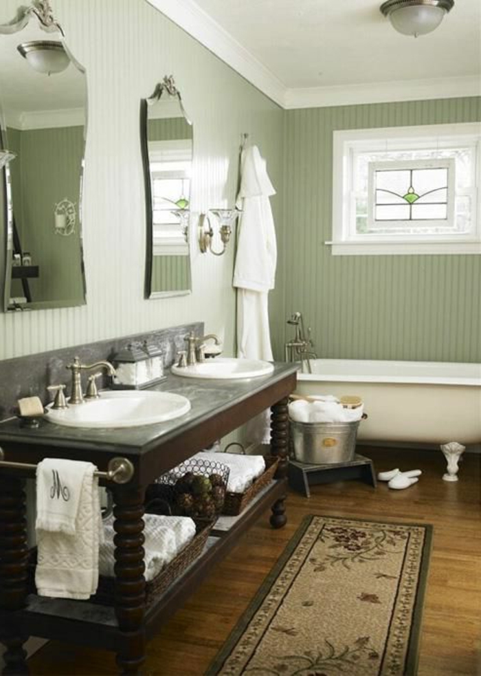 ikea-accessoire-salle-de-bain-avec-un-tapis-rétro-et-murs-verts-plafond-blanc