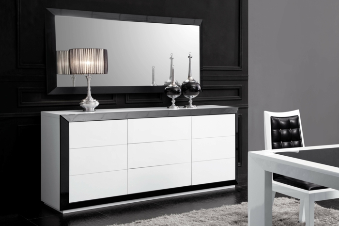 intérieur-blanc-noir-tapis-gris-dans-la-salle-de-séjour-avec-une-chaise-et-table-de-cuisine