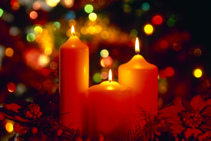 15 Jan 2010, Wirral, Merseyside, England --- Christmas candles lit, England --- Image by © Paul Thompson/Corbis
