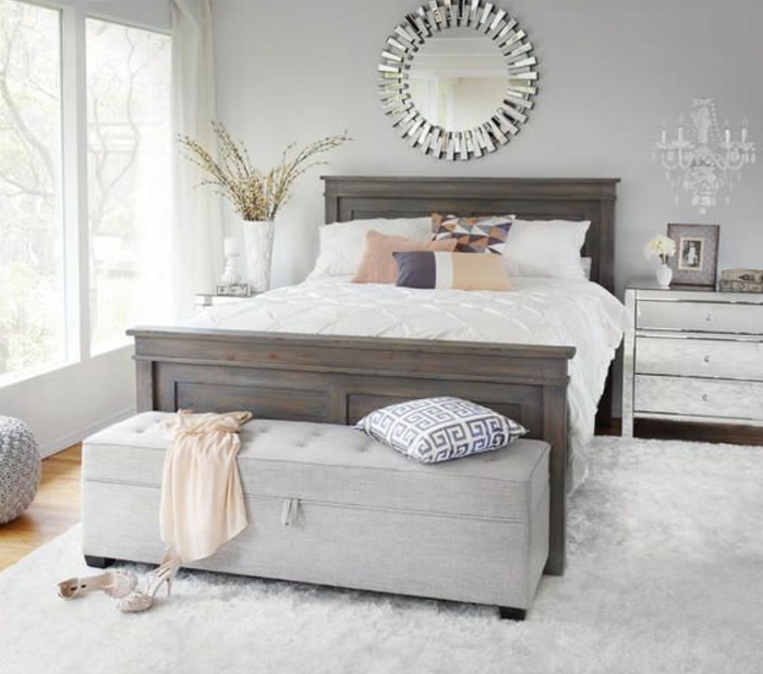 jolie-chambre-a-coucher-avec-bout-de-lit-ikea-gris-tapis-blanc-lit-en-bois-gris-fleurs-d-interieur