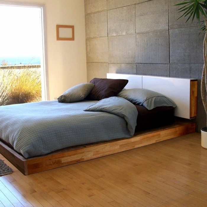 0-chambre-a-coucher-moderne-avec-sol-en-parquet-clair-et-tête-de-lit-originale