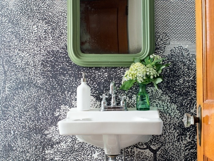 Small bathrooms can be a challenge to decorate, but they can also be a great place to be bold and daring with pattern, color and style. It’s a perfect room for some graphic wallpaper that will make a big statement in this little space.
