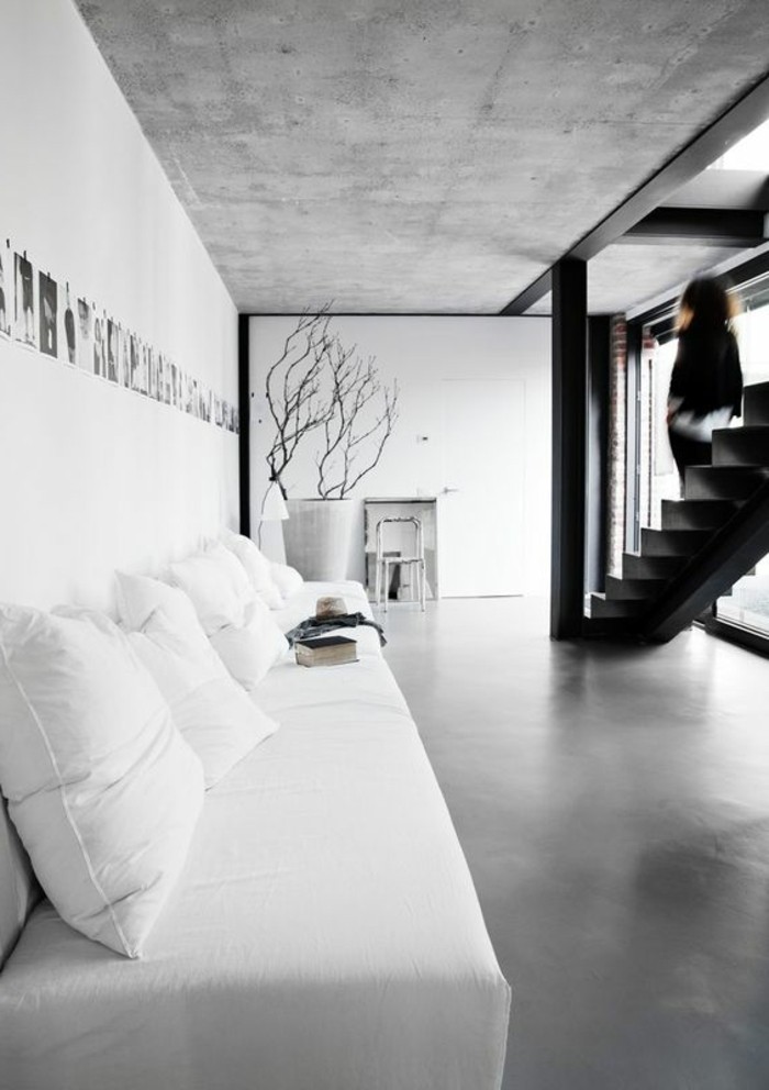 0-salon-avec-un-plan-de-travail-béton-ciré-béton-décoratif-de-couleur-gris-meubles-blancs