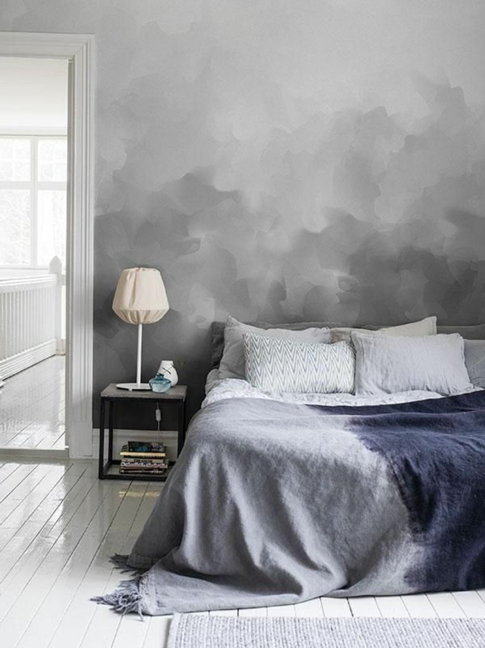 Agréable-ambiance-dans-la-belle-pièce-peinte-en-couleur-tendance-pour-chambre-à-coucher-voir-le-gris-a-la-mode