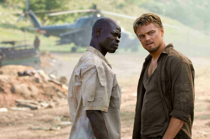 LEONARDO DiCAPRIO stars as Danny Archer and DJIMON HOUNSOU stars as Solomon Vandy in Warner Bros. Pictures' and Virtual Studios' action drama "Blood Diamond," distributed by Warner Bros. Pictures. PHOTOGRAPHS TO BE USED SOLELY FOR ADVERTISING, PROMOTION, PUBLICITY OR REVIEWS OF THIS SPECIFIC MOTION PICTURE AND TO REMAIN THE PROPERTY OF THE STUDIO. NOT FOR SALE OR REDISTRIBUTION.