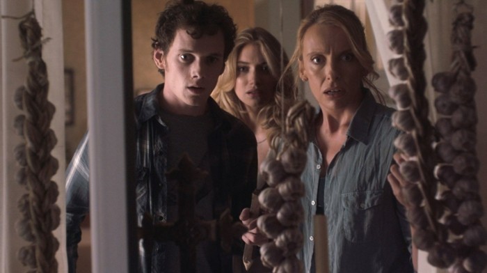 "FRIGHT NIGHT" FN-031 Charley Brewster (Anton Yelchin, right), his mom Jane (Toni Collette, left) and girlfriend Amy (Imogen Poots, center) are terrorized by a bloodthirsty vampire in DreamWorks Pictures’ horror film “Fright Night.” Directed by Craig Gillespie, “Fright Night” is produced by Michael De Luca and Alison Rosenzweig. ©DreamWorks II Distribution Co., LLC.  All Rights Reserved.