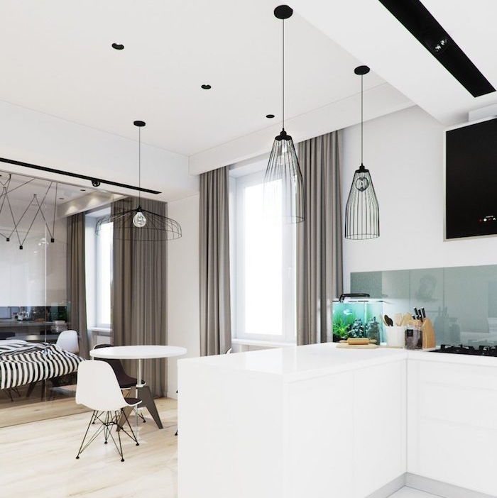deco petit appartement avec cuisine moderne blanche et credence verre, cuisine ouverte sur salle à manger et verrière séparation chambre