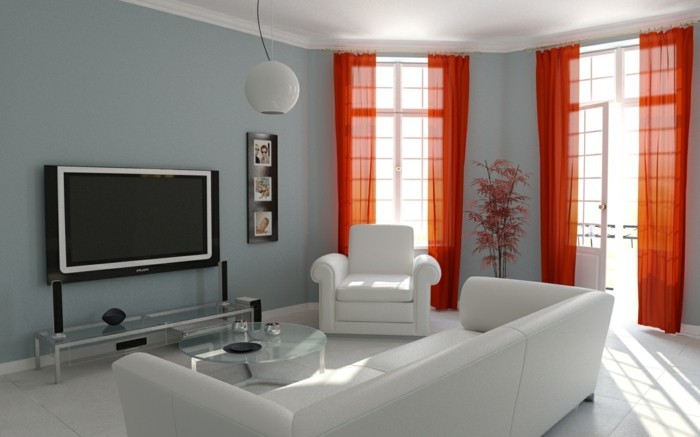 idée-déco-petit-salon-en-blanc-rideaux-orange-légers-syle-simple-raffiné