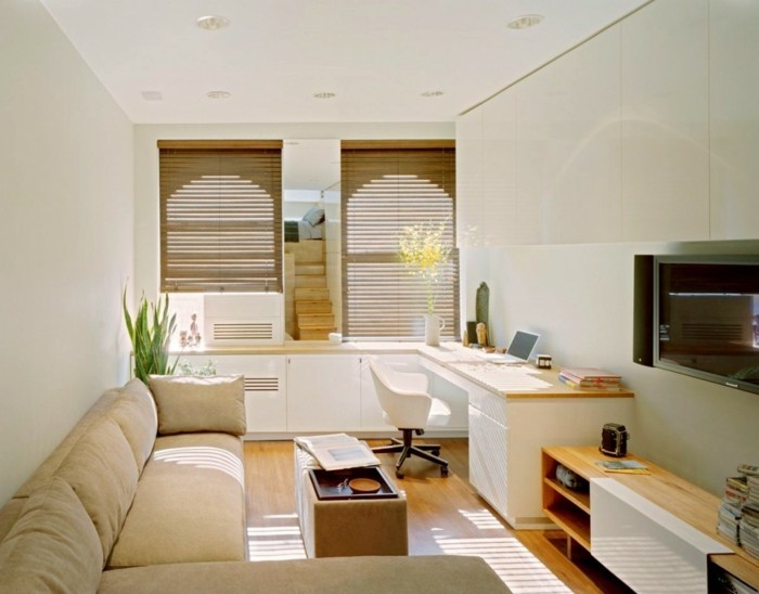 idée-déco-petit-salon-très-moderne-décor-en-blanc-meubles-en-bois-coin-repos-coin-travaill