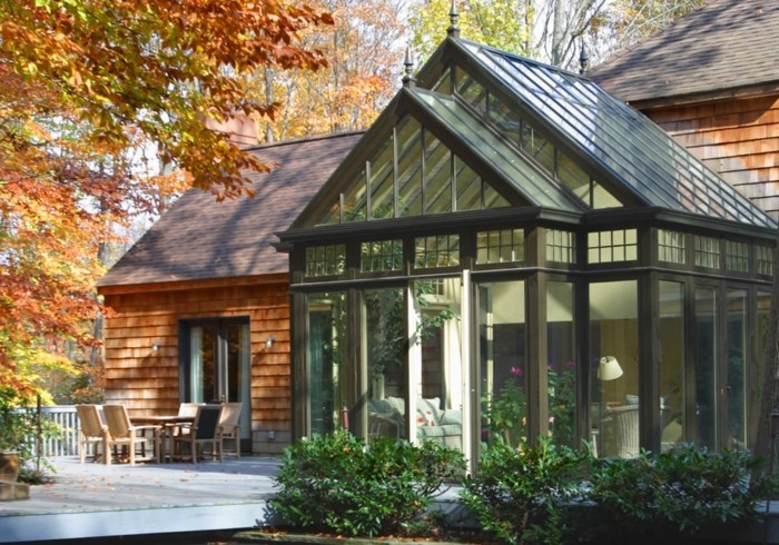 modele-de-veranda-moderne-construction-en-harmonie-complète-avec-la-maison-un-paysage-pittoresque