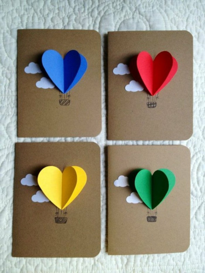 decoupage-faire-part-creatif-en-carton-avec-des-coeurs-origami-colores