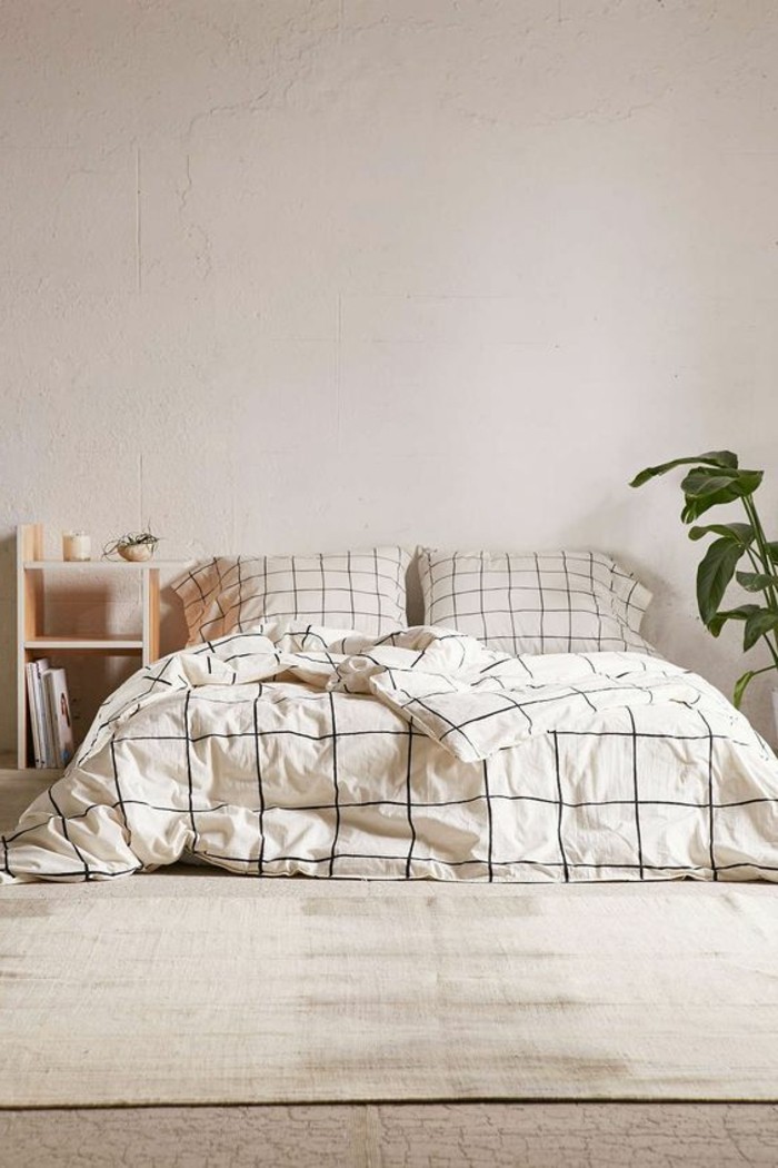 couverture-de-lit-beige-tapis-beige-mur-beige-interieur-taup-chambre-a-coucher-moderne