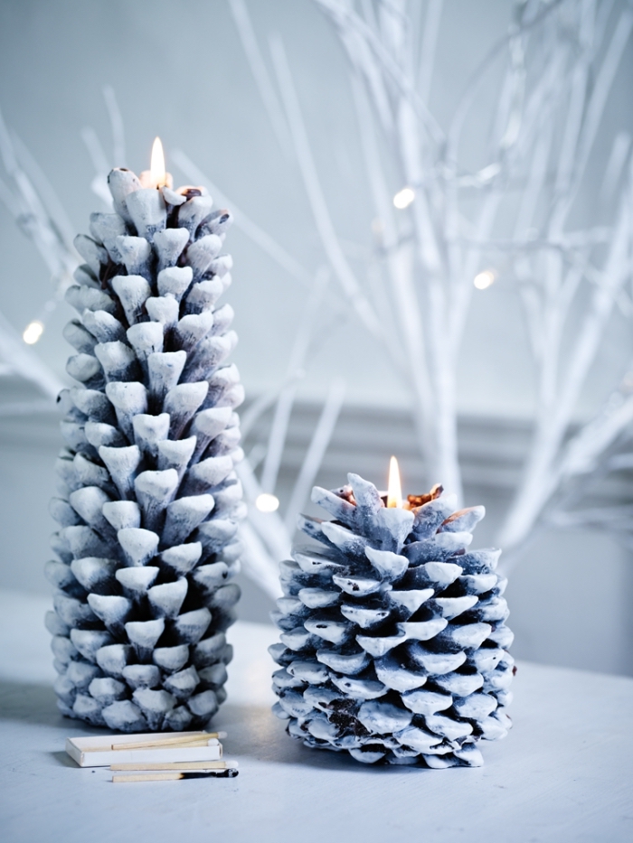 modèles de sapin de Noël diy, décoration avec pomme de pin noel, diy bougeoir en pomme de pin colorée en blanc