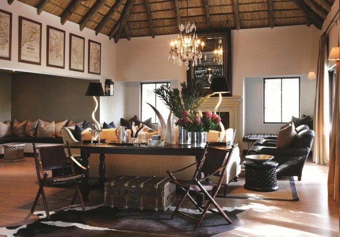 lampe-africaine-plafond-en-paille-et-en-bois-coussins-canape-fauteuil