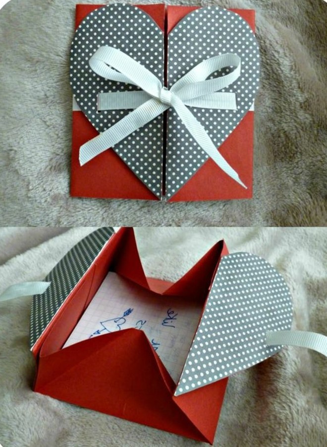 origami-enveloppe-avec-un-coeur-au-milieu-couleurs-rouge-blanc-et-noir-noeud-blanc