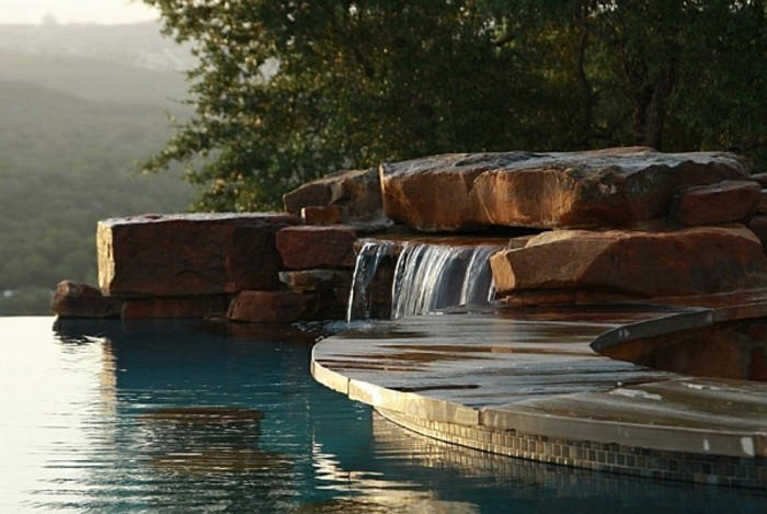 fontaine-piscine-coucher-de-soleil-inoubliable-extérieur-tropicale