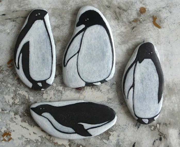 galets-peints-des-dessins-de-penguins-sur-galets-idee-d-activité-créative-enfant-et-adulte