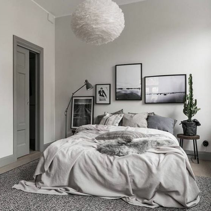 linge-de-maison-differentes-teintes-du-gris-idee-comment-amenager-une-chambre-scandinave-tapis-gris-photos-comme-deco-murale