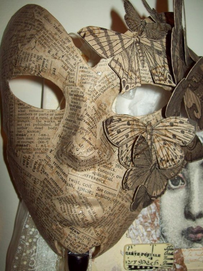 masque-carnaval-enveloppée-de-bandes-de-papier-journal-idée-comment-faire-du-papier-maché-tuto-resized