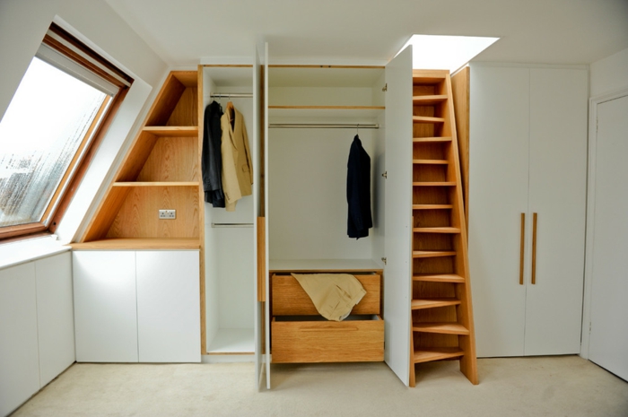 dressing sous pente, placards, tiroirs, penderie, meuble en bois, rangement astucieux pour optimiser l'espace