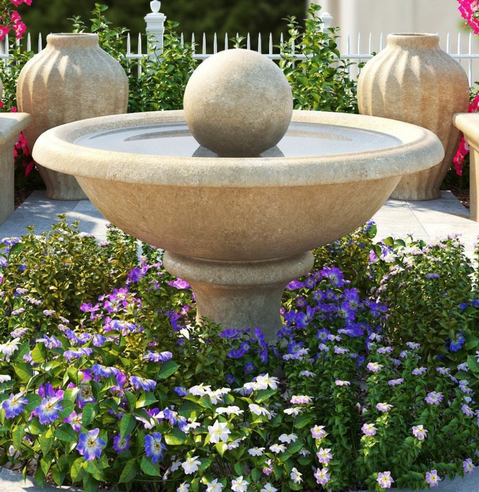 une fontaine en pierre, entouré de fleurs violettes et blanches en forme de cercle, une clôture blanche, deco exterieur, paysage exotique