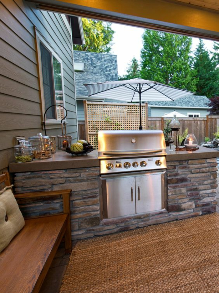 espace barbecue et cuisine d'extérieur en pierre naturelle 