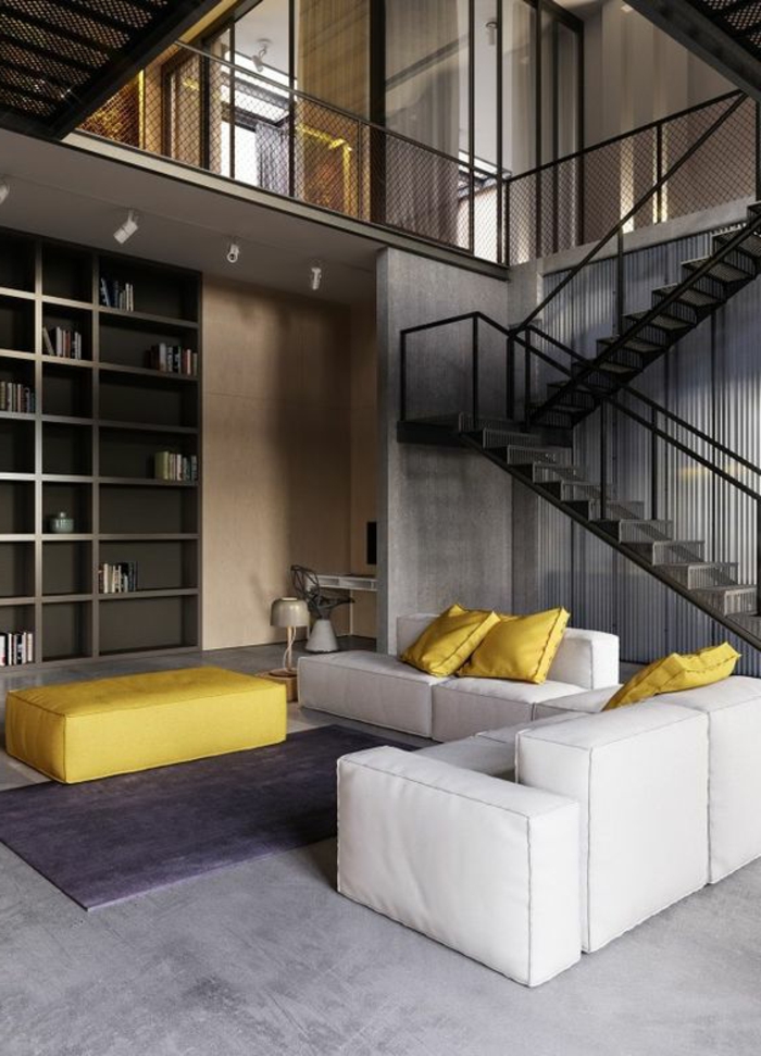 salon jaune et gris, joli salon contemporain, escalier tournant et bibliothèque intégrée, meubles géométriques