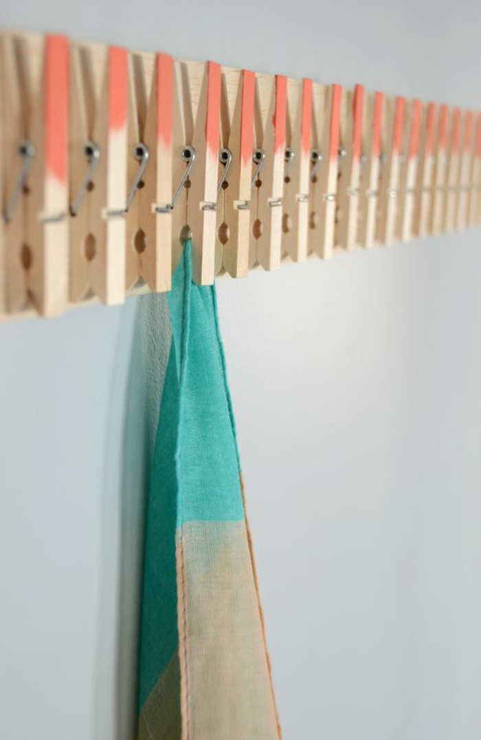 un porte-torchons réalisé avec des pinces à linge en bois ombre, que faire avec des pinces à linges en bois