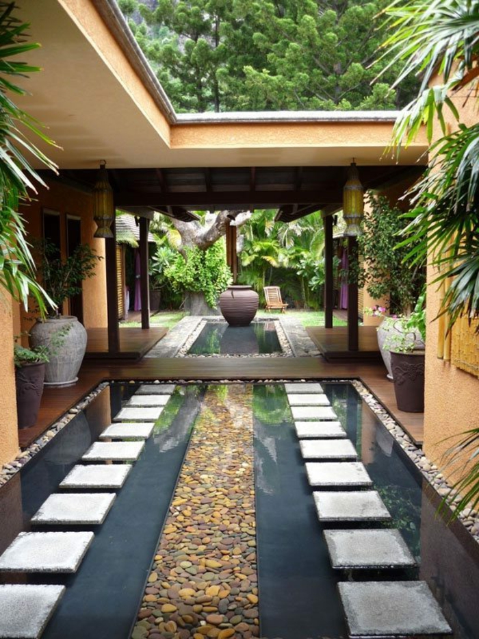  idee deco jardin, bassin d'eau, galets, grandes vases céramiques, plantes vertes, jardin zen japonais