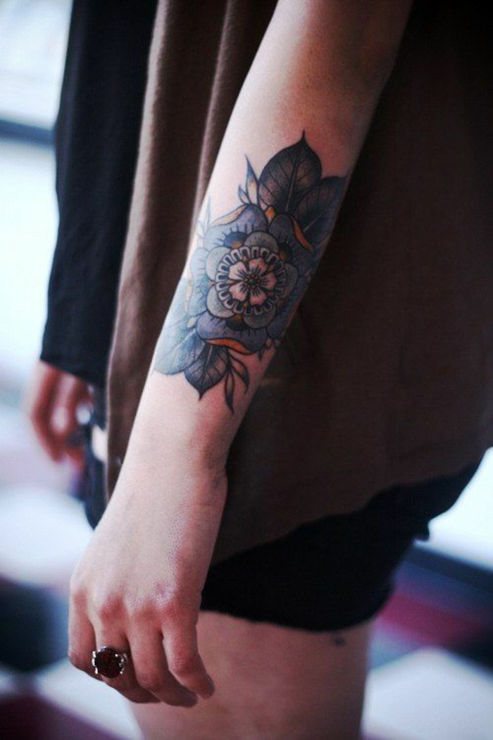 Fleur de lotus signification tatouage mandala femme