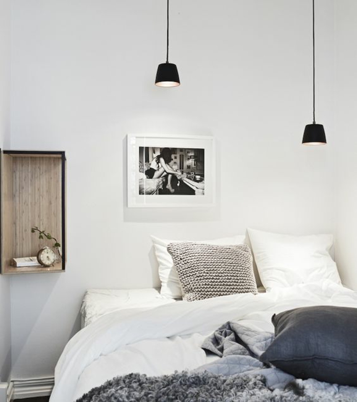 un luminaire suspension noir au style minimaliste, chambre à coucher scandinave à décor chaleureux