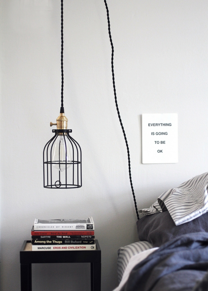 une lampe cage au design épuré, éclairage moderne dans une chambre à coucher au style minimaliste