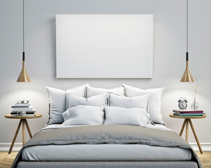 une chambre à coucher bleu gris pâle, intérieur monochrome élégant, une suspension chevet scandinave en bois naturel et métal noir